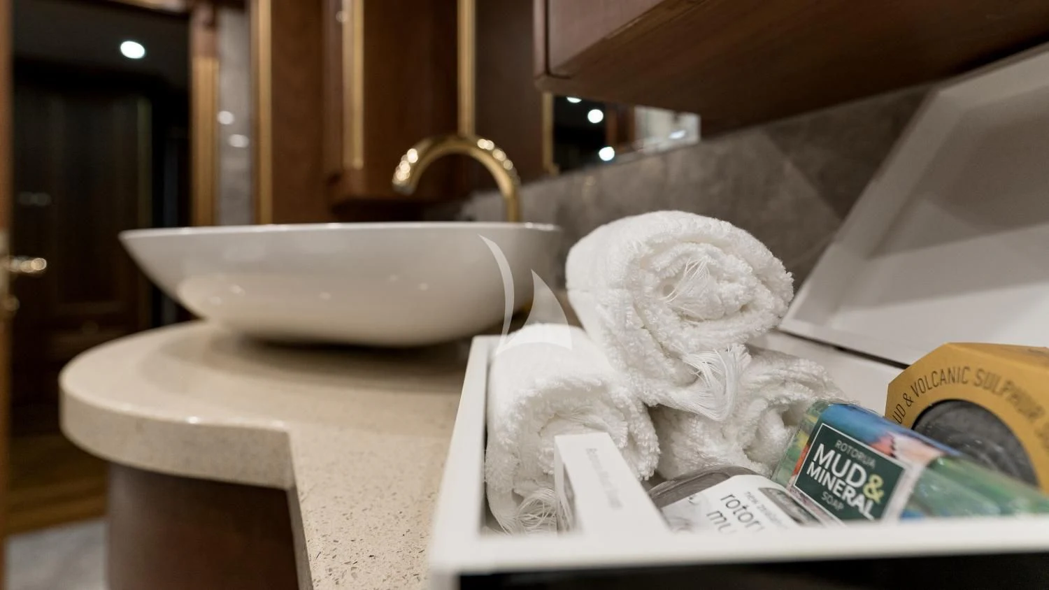 a sink with a towel on it aboard IRAMA Yacht for Sale