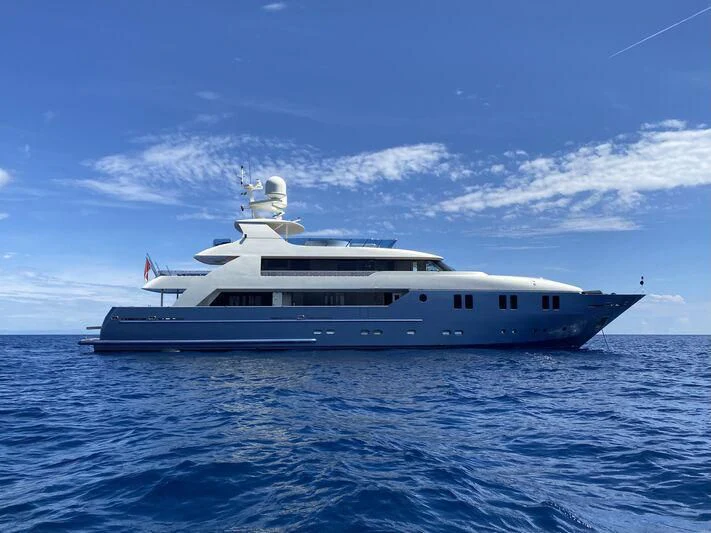 a large white boat in the water aboard IRAMA Yacht for Sale