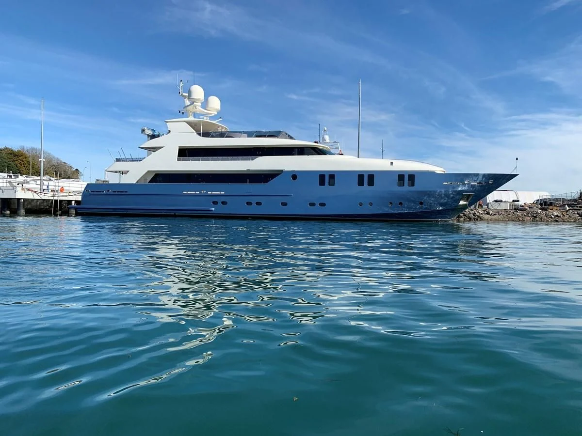 a large white boat in the water aboard IRAMA Yacht for Sale