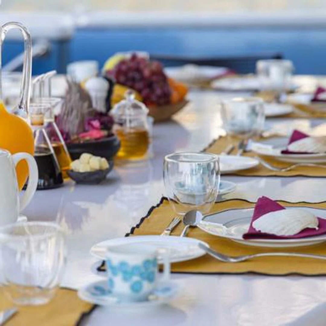 a table full of food aboard IRAMA Yacht for Sale