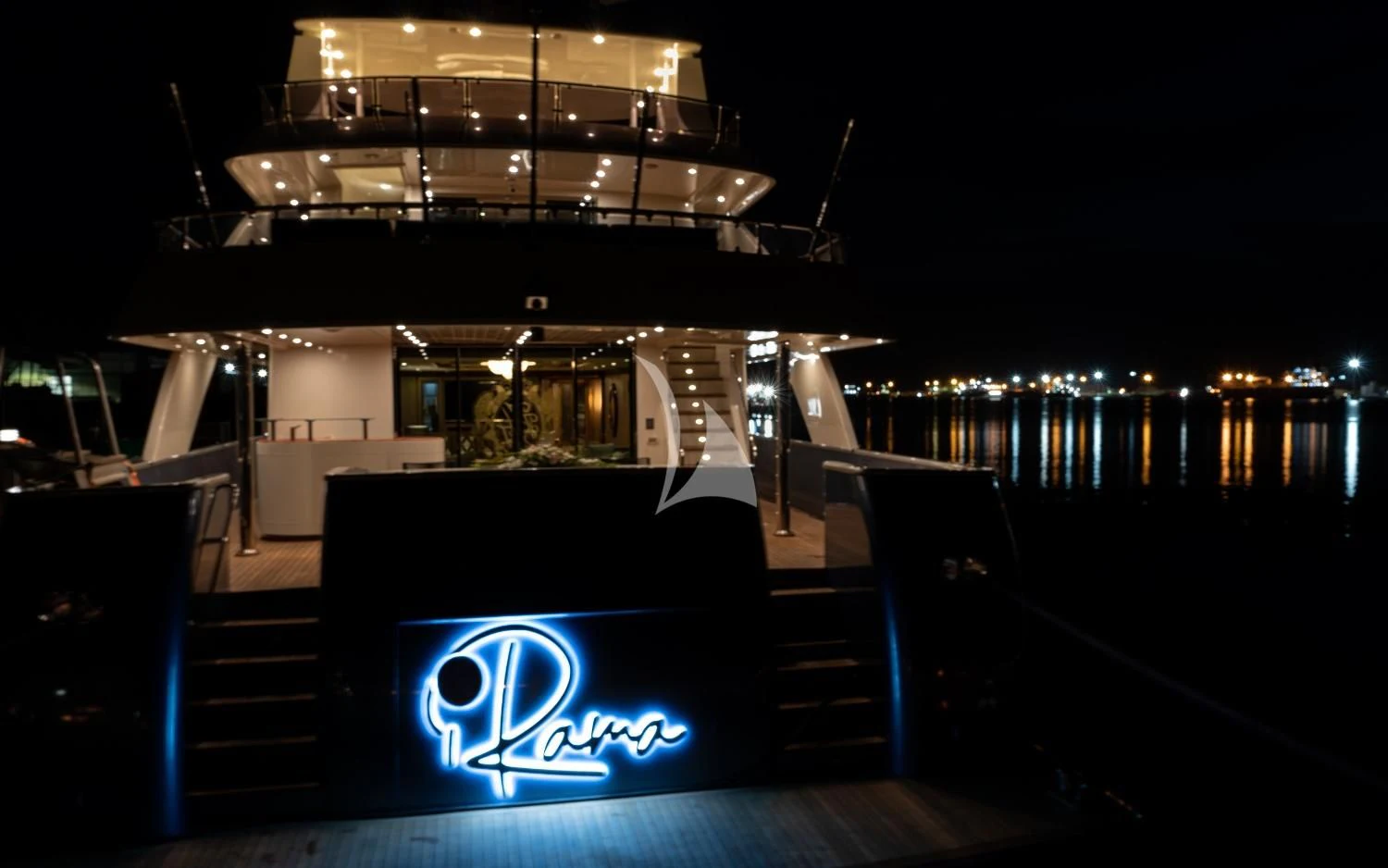 a lit up bar with a large lit up bar on the roof aboard IRAMA Yacht for Sale