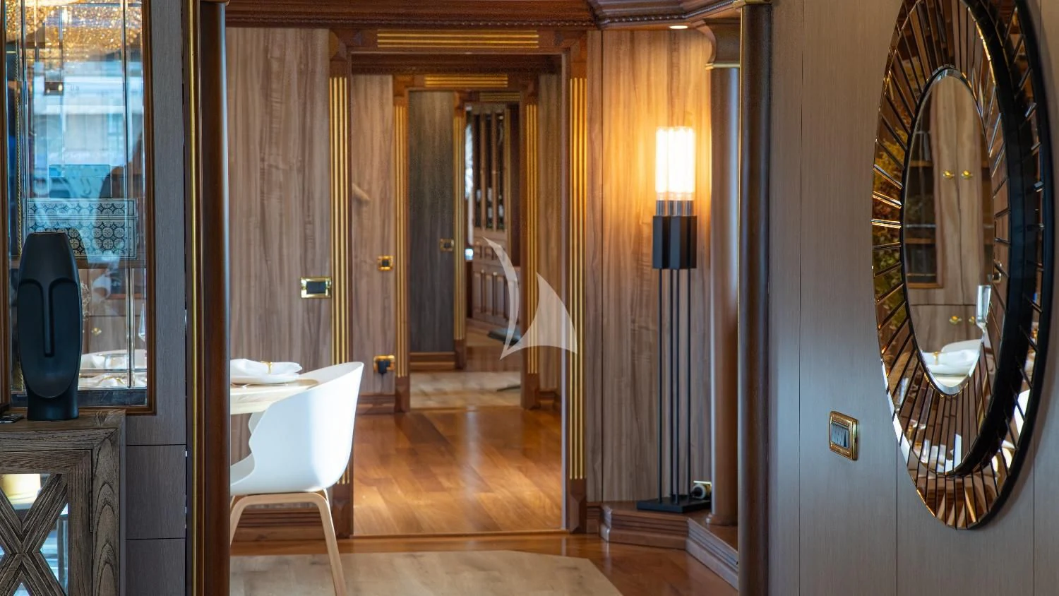 a room with a mirror and a chair aboard IRAMA Yacht for Sale
