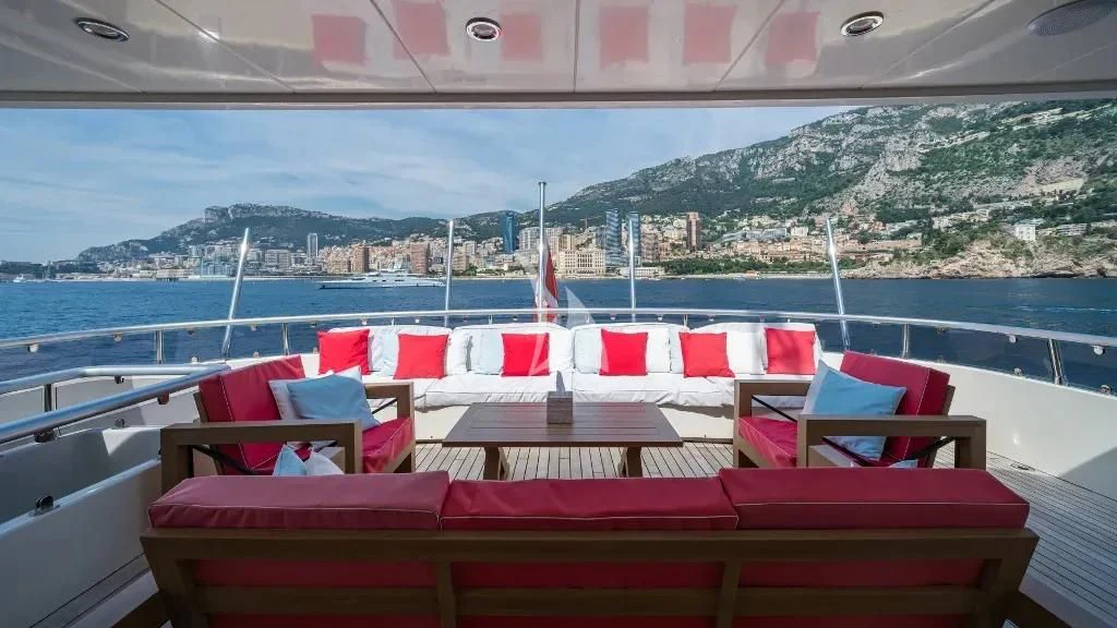 a boat with chairs on it aboard IRAMA Yacht for Sale