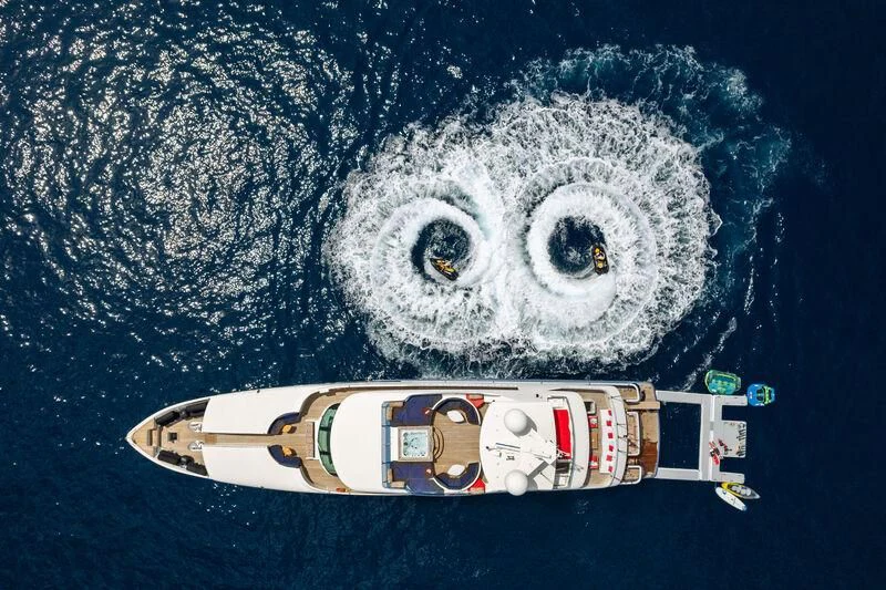 a stuffed animal on a blue surface aboard IRAMA Yacht for Sale