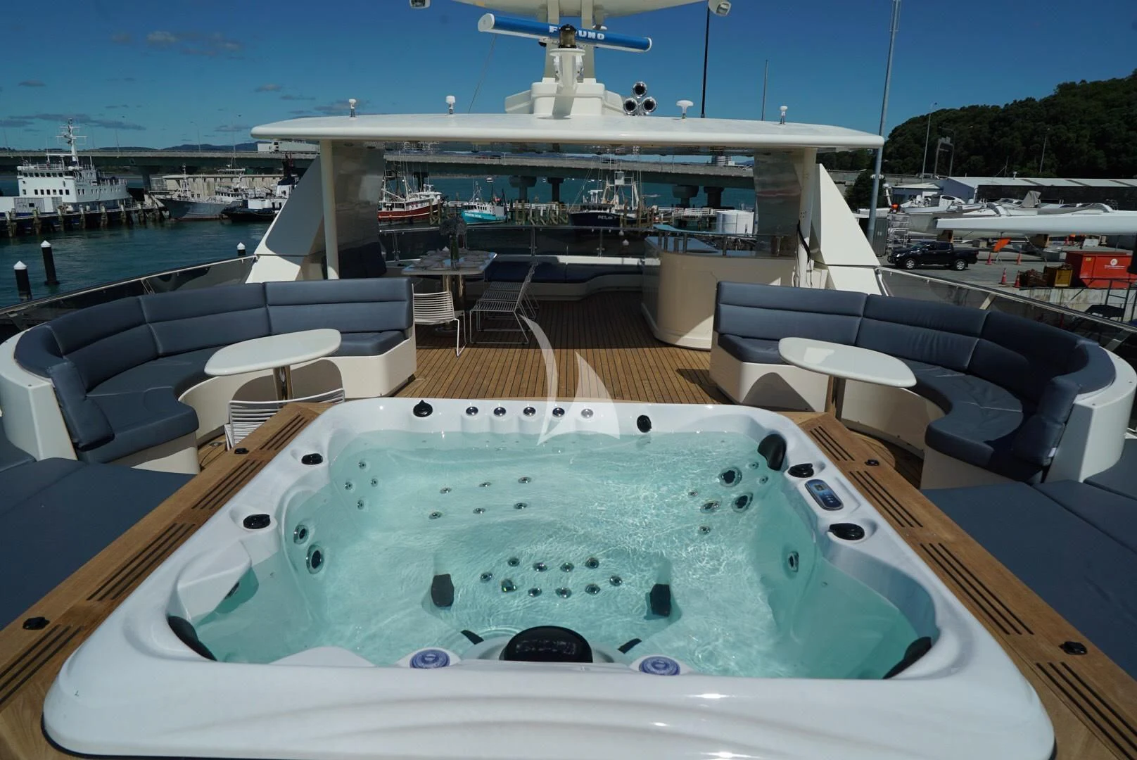 a swimming pool on a deck aboard IRAMA Yacht for Sale