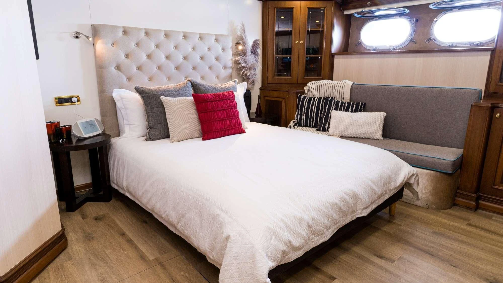 a bed in a room aboard IRAMA Yacht for Sale