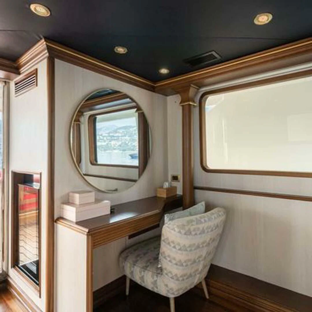 a chair in a room aboard IRAMA Yacht for Sale