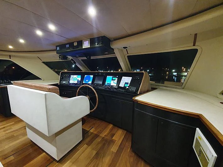 a room with a desk and a computer aboard IRAMA Yacht for Sale