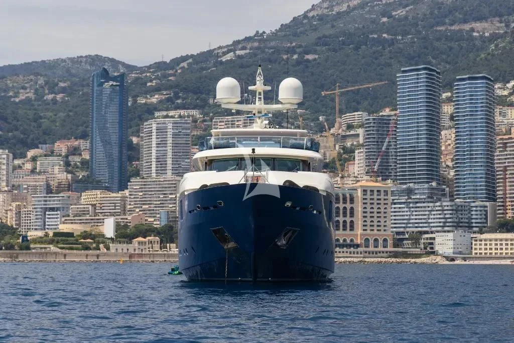a large ship in the water aboard IRAMA Yacht for Sale
