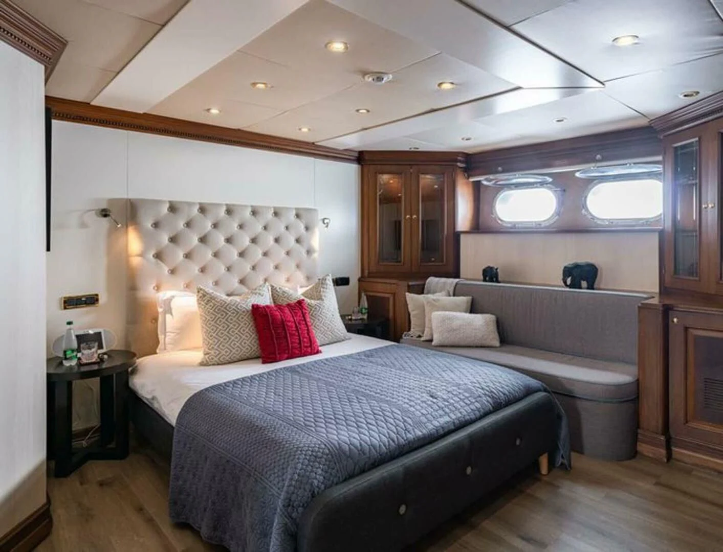 a room with two beds aboard IRAMA Yacht for Sale