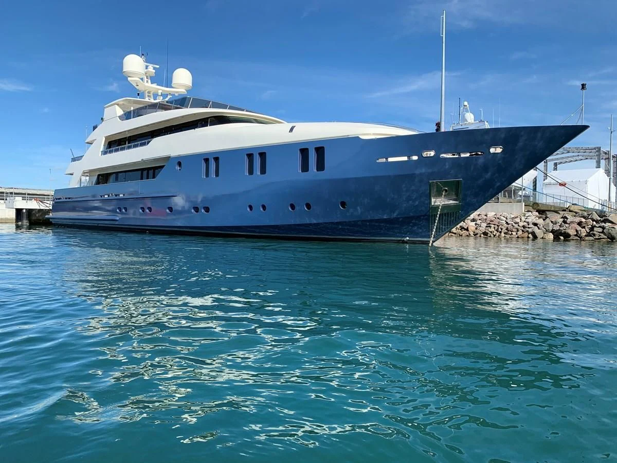 a large white boat in the water aboard IRAMA Yacht for Sale