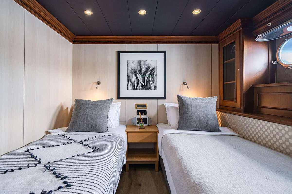 a couple of beds in a room aboard IRAMA Yacht for Sale