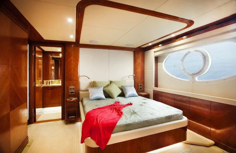 a room with two beds aboard GRAND CRU Yacht for Sale