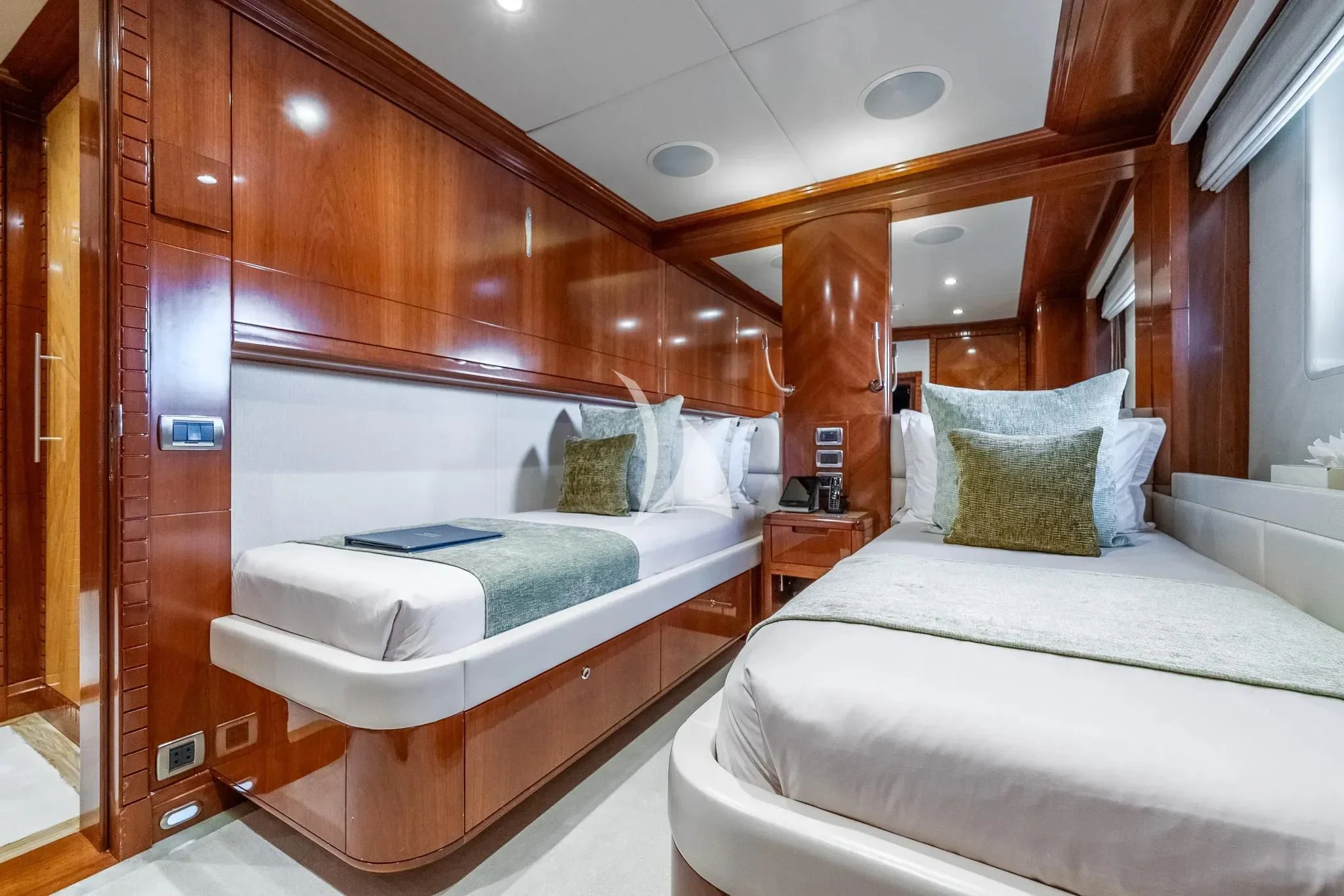 a room with two beds aboard GRAND CRU Yacht for Sale