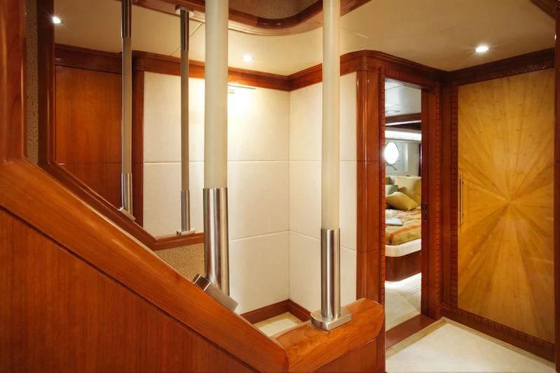 a bathroom with a wood cabinet aboard GRAND CRU Yacht for Sale