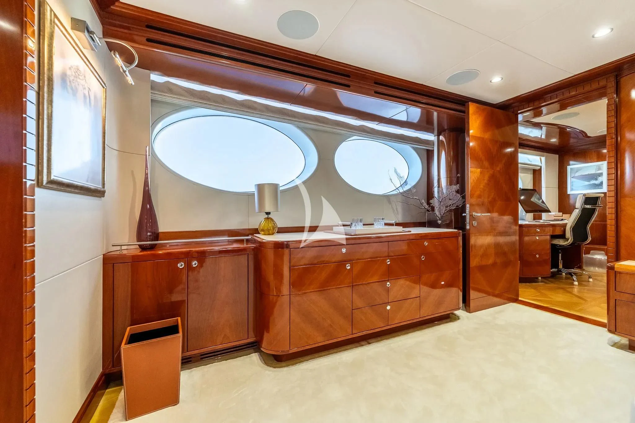 a room with a large mirror aboard GRAND CRU Yacht for Sale