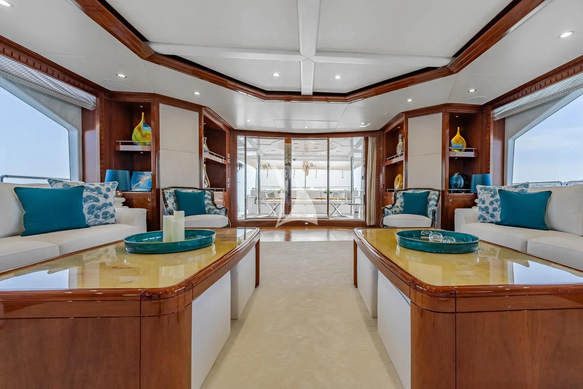 a living room with a large window aboard GRAND CRU Yacht for Sale