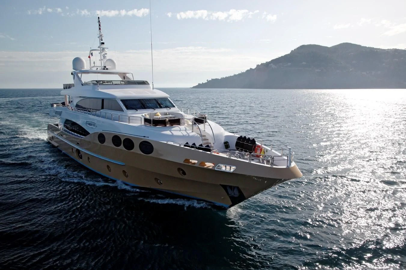 a white boat on the water aboard GRAND CRU Yacht for Sale