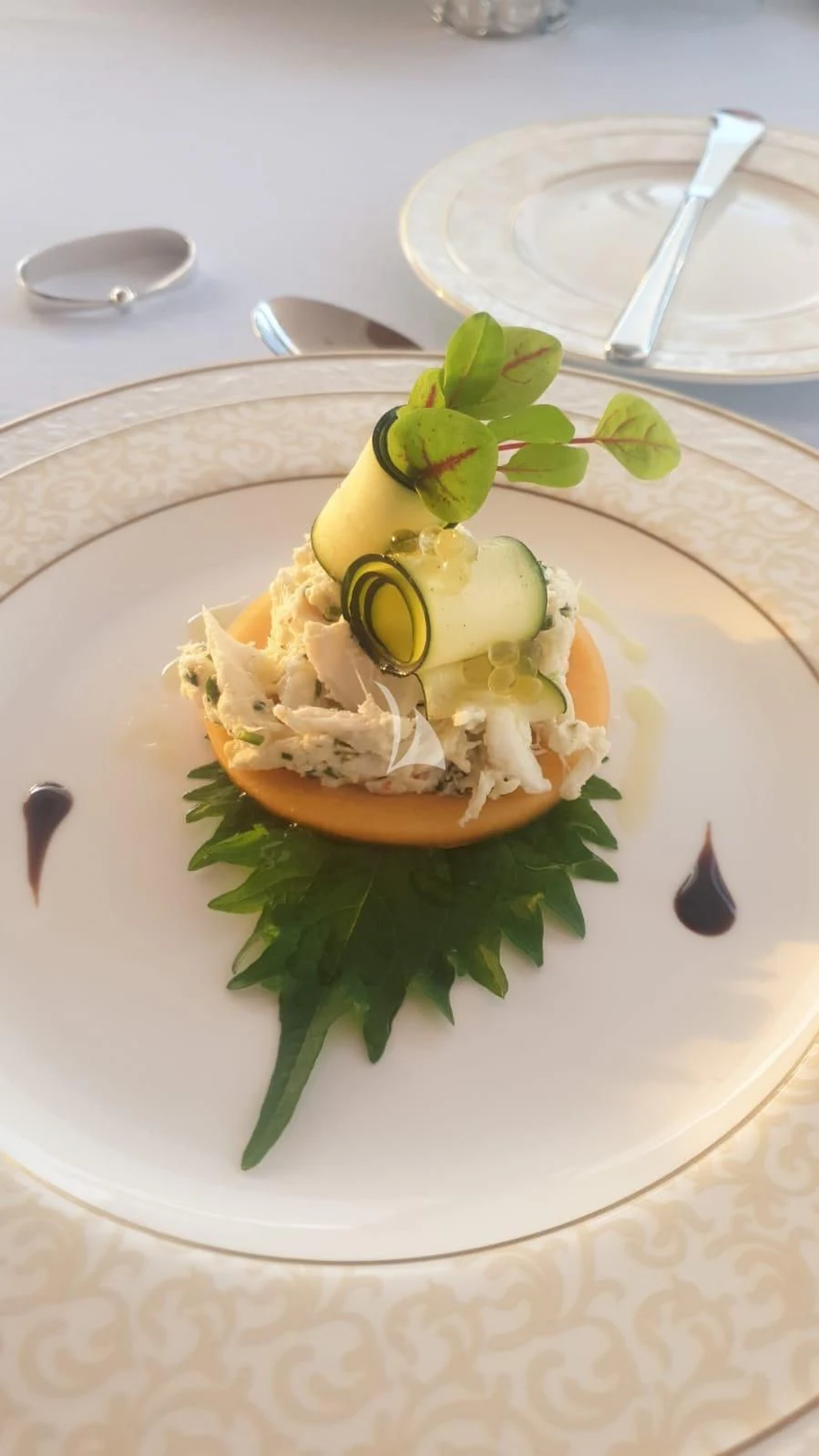 a plate of food aboard GRAND CRU Yacht for Sale