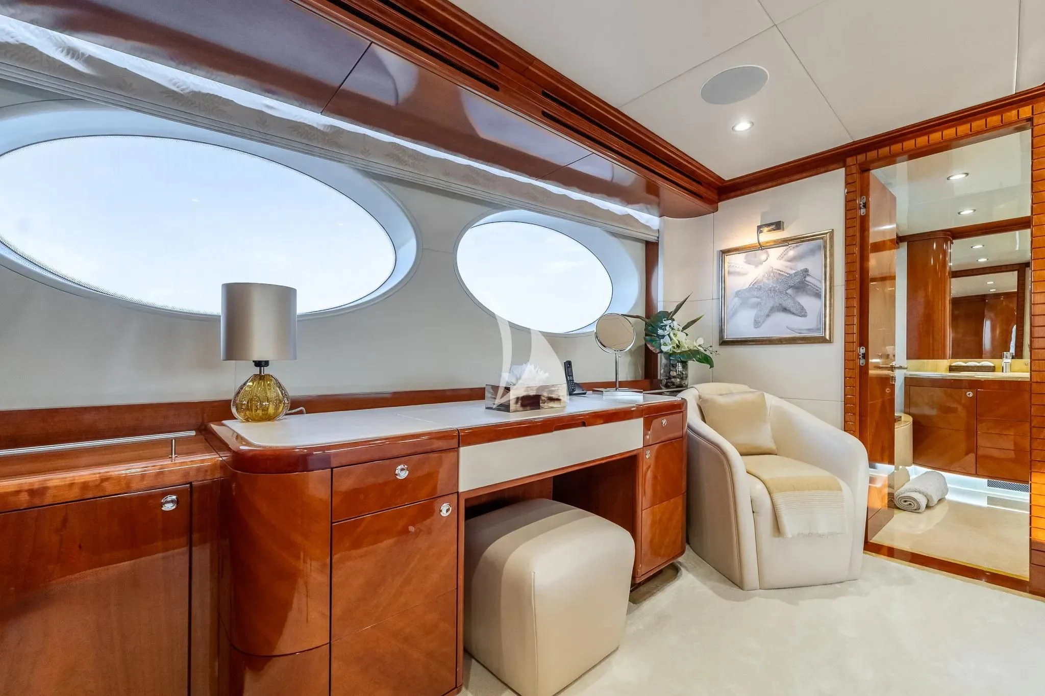 a room with a desk and a chair aboard GRAND CRU Yacht for Sale