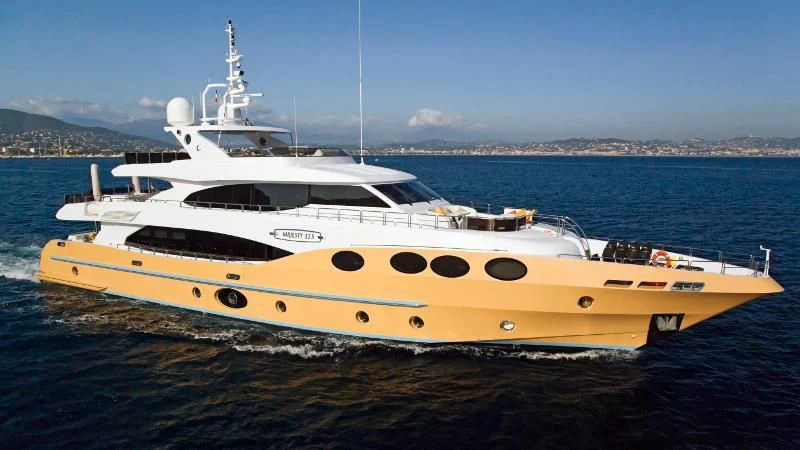 a large white yacht on the water aboard GRAND CRU Yacht for Sale
