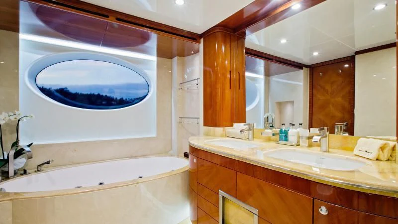 a bathroom with a large jacuzzi tub aboard GRAND CRU Yacht for Sale