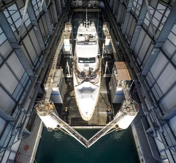 a ship in a large building aboard GRAND CRU Yacht for Sale