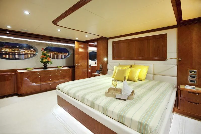 a hotel room with a bed aboard GRAND CRU Yacht for Sale