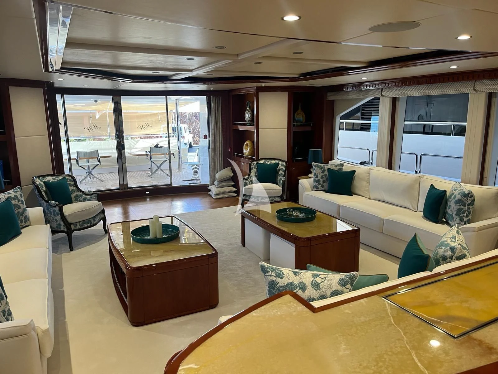 a living room with a large window aboard GRAND CRU Yacht for Sale