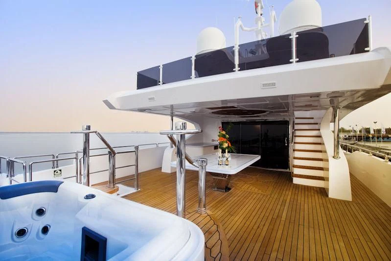 a large white boat in a large room aboard GRAND CRU Yacht for Sale