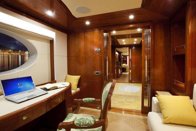 a room with a laptop and a desk aboard GRAND CRU Yacht for Sale