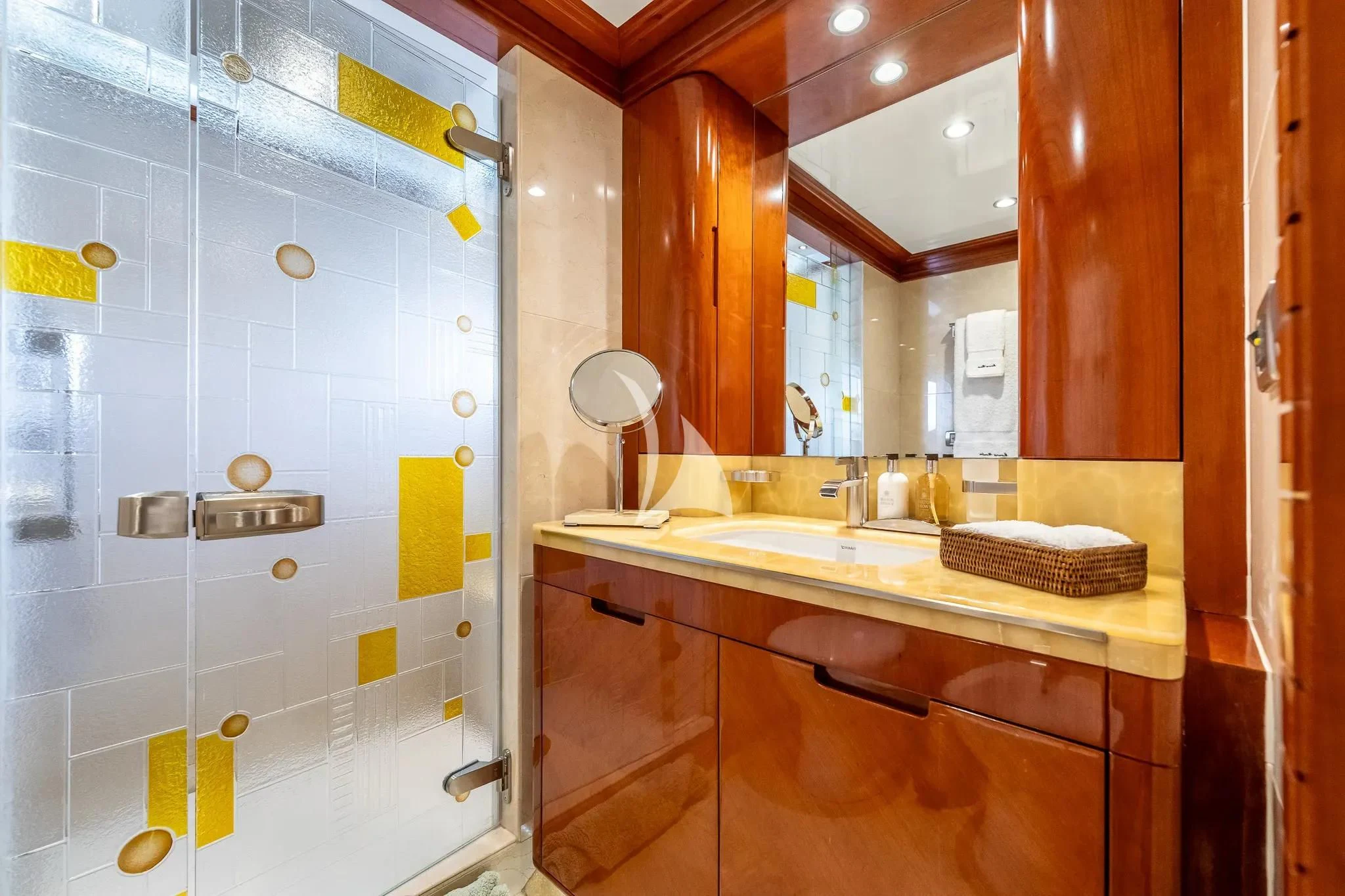 a bathroom with a large mirror aboard GRAND CRU Yacht for Sale