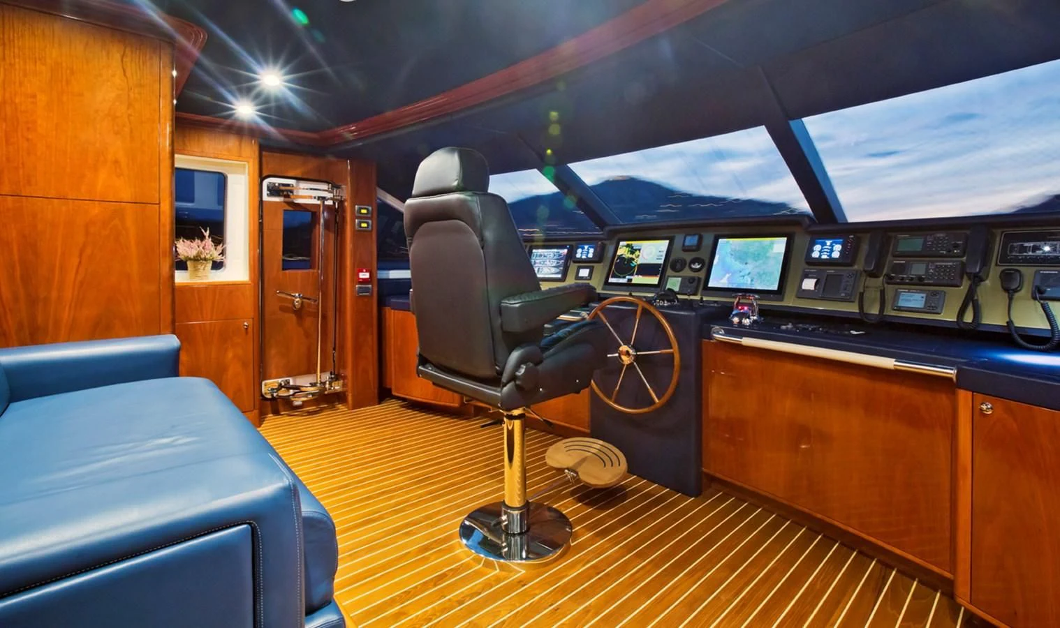 a room with a chair and a desk aboard GRAND CRU Yacht for Sale