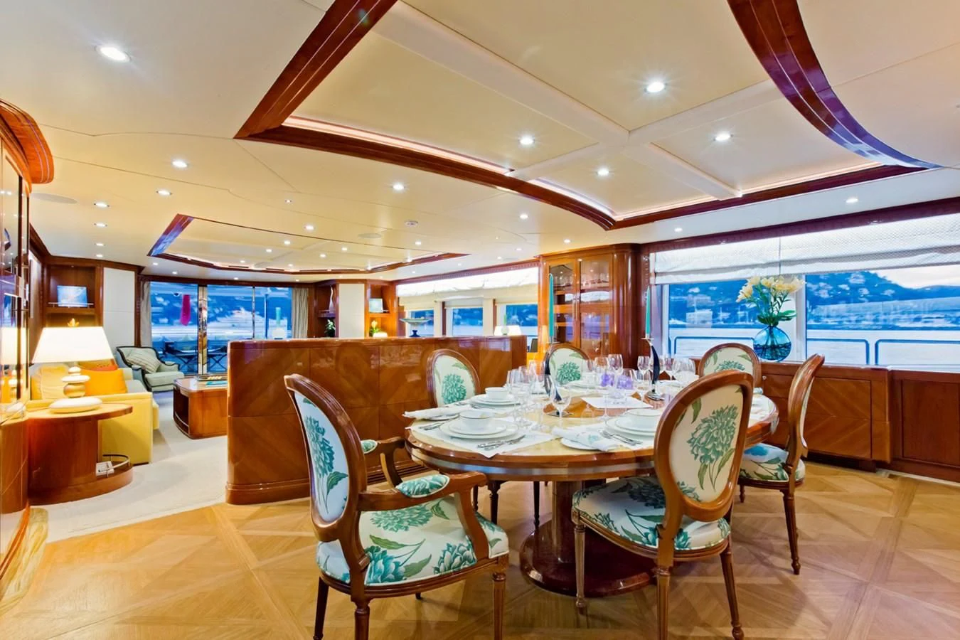 a dining room with a table and chairs aboard GRAND CRU Yacht for Sale