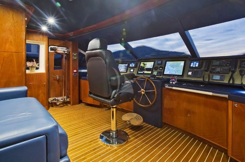 a room with a chair and a desk aboard GRAND CRU Yacht for Sale