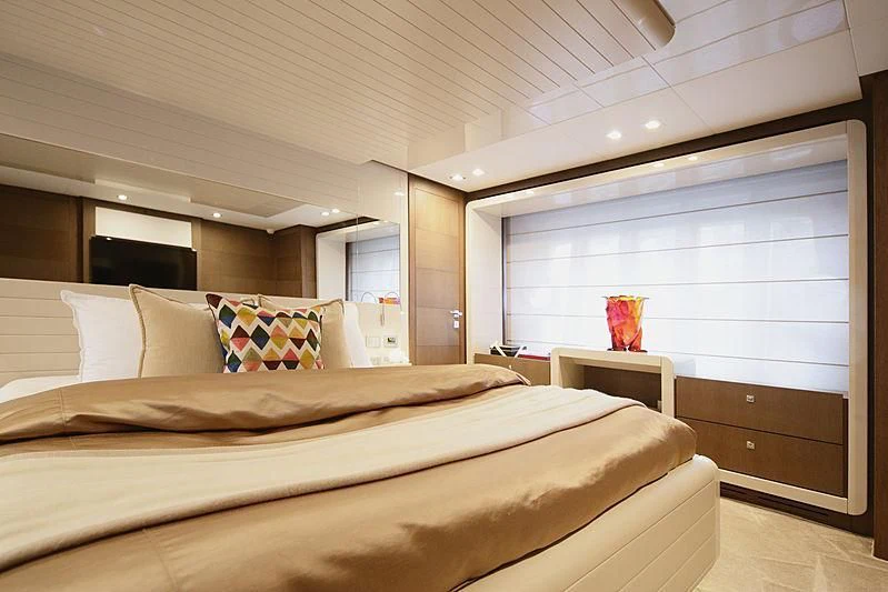 a bed with a large bed aboard TOP SHELF Yacht for Sale