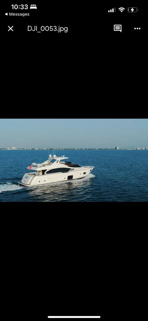 a white yacht in the water aboard TOP SHELF Yacht for Sale