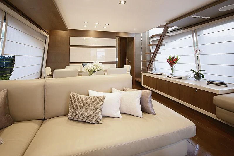 a couch in a room aboard TOP SHELF Yacht for Sale