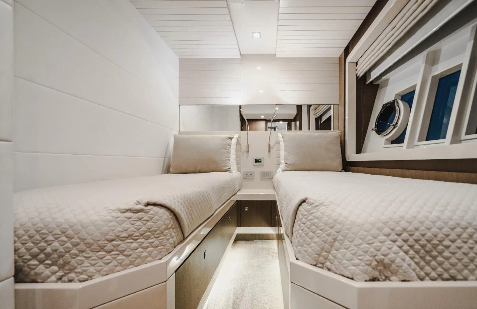a room with two beds aboard TOP SHELF Yacht for Sale