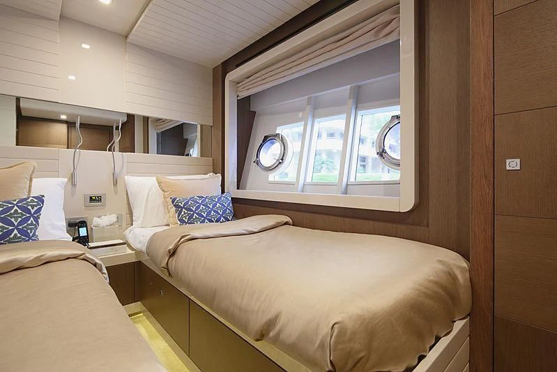 a couple of beds in a room aboard TOP SHELF Yacht for Sale