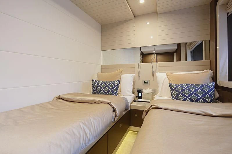 a couple of beds in a room aboard TOP SHELF Yacht for Sale