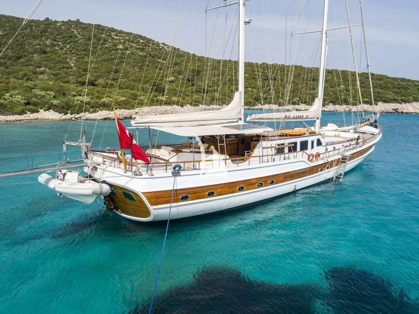 a boat in the water aboard CANER IV Yacht for Sale