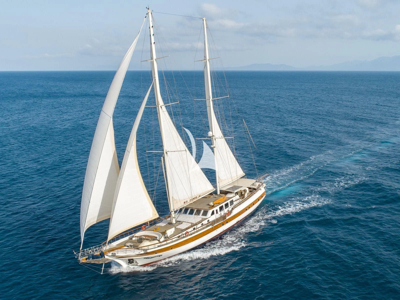 a sailboat on the water aboard CANER IV Yacht for Sale