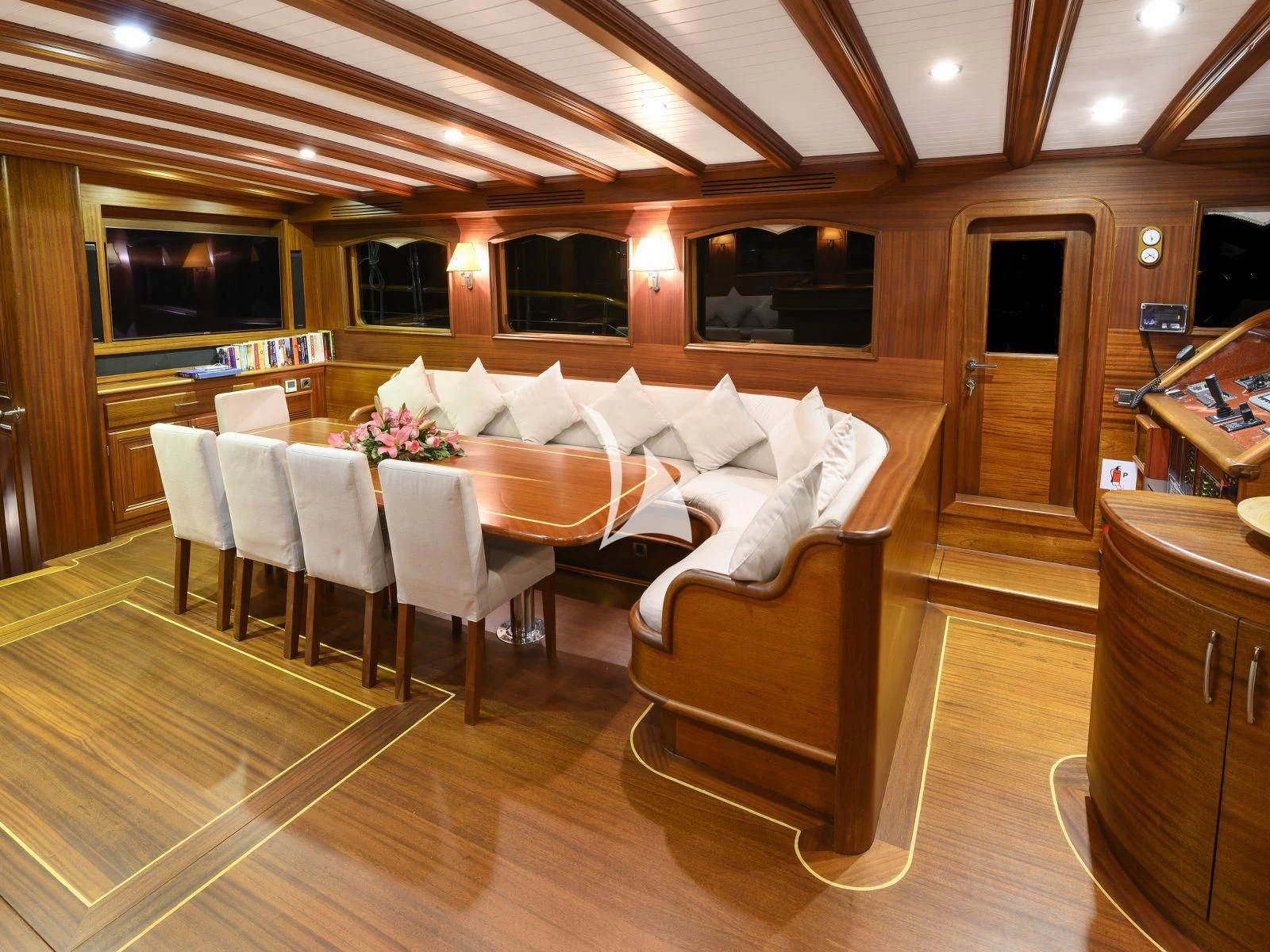 a room with a couch and chairs aboard CANER IV Yacht for Sale