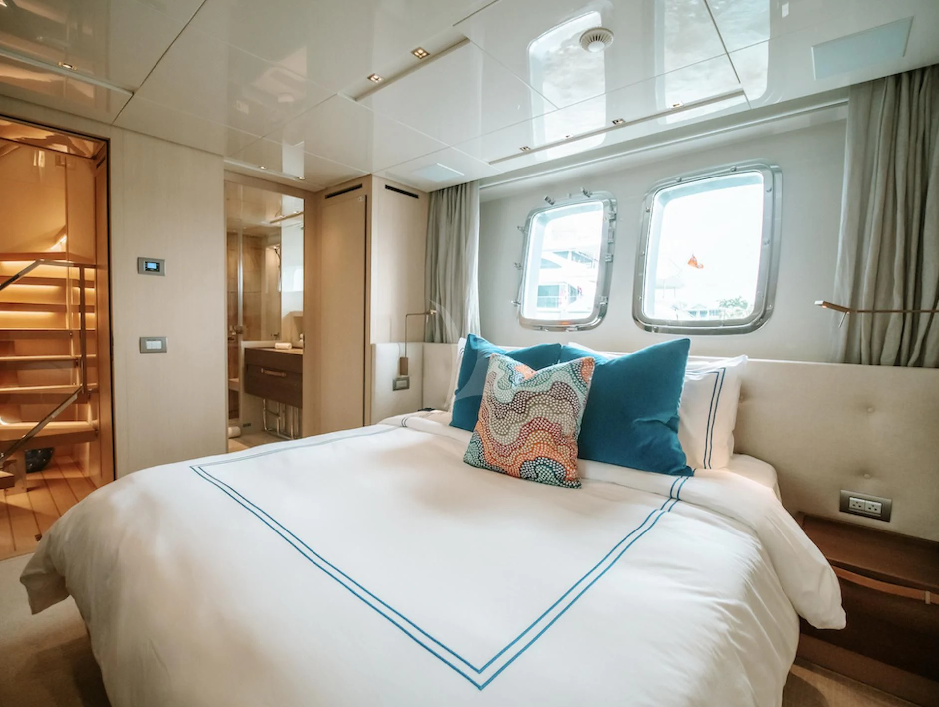 a bed in a room aboard FIFTY SHADES Yacht for Sale
