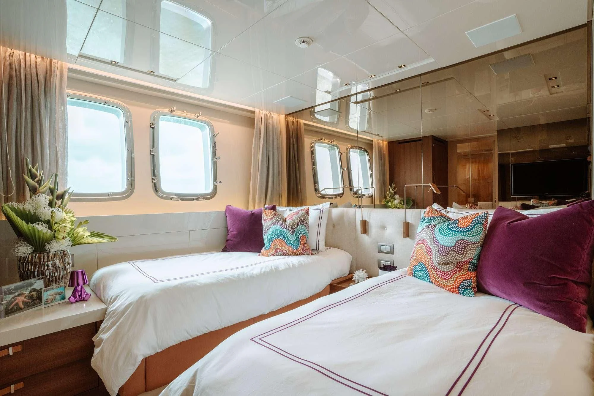 a couple of beds in a room aboard FIFTY SHADES Yacht for Sale