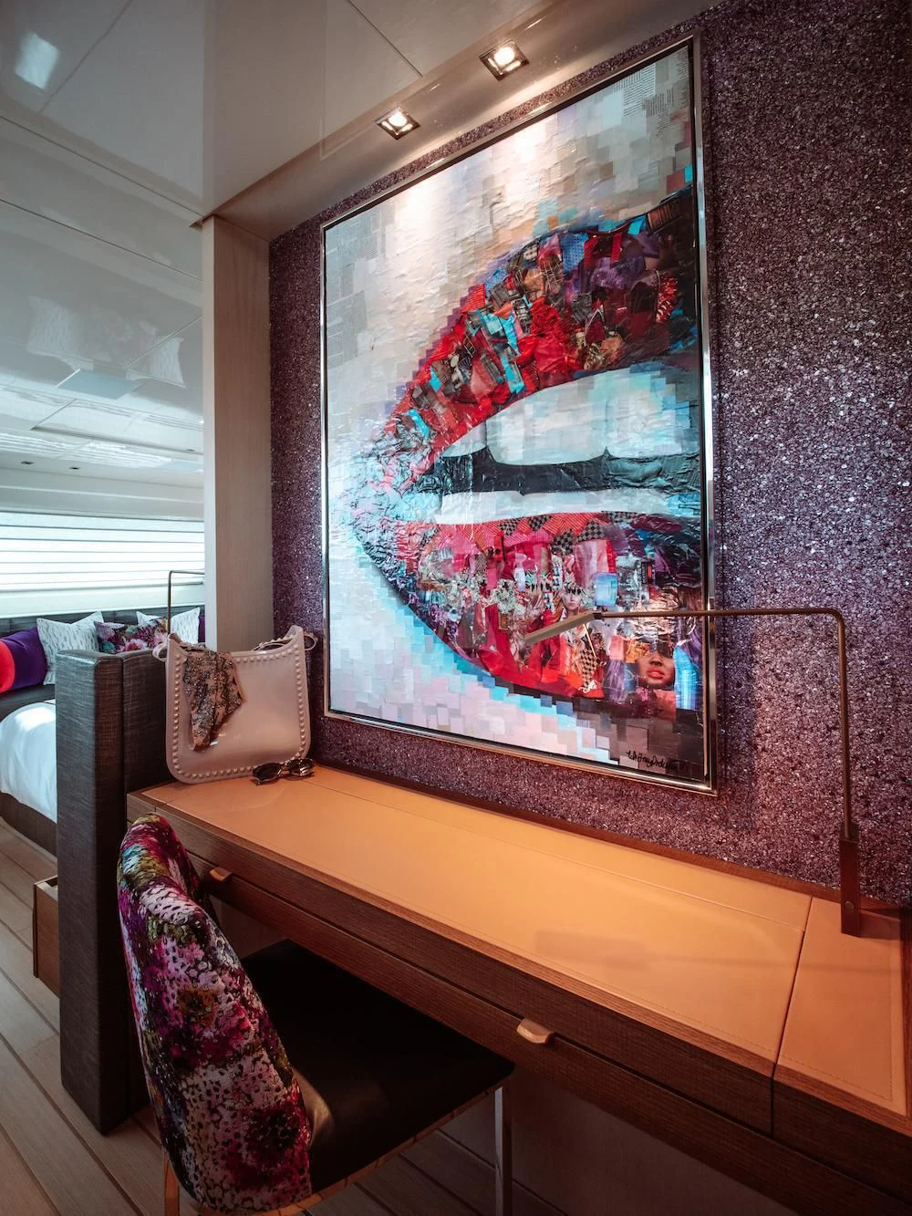 a room with a painting on the wall aboard FIFTY SHADES Yacht for Sale