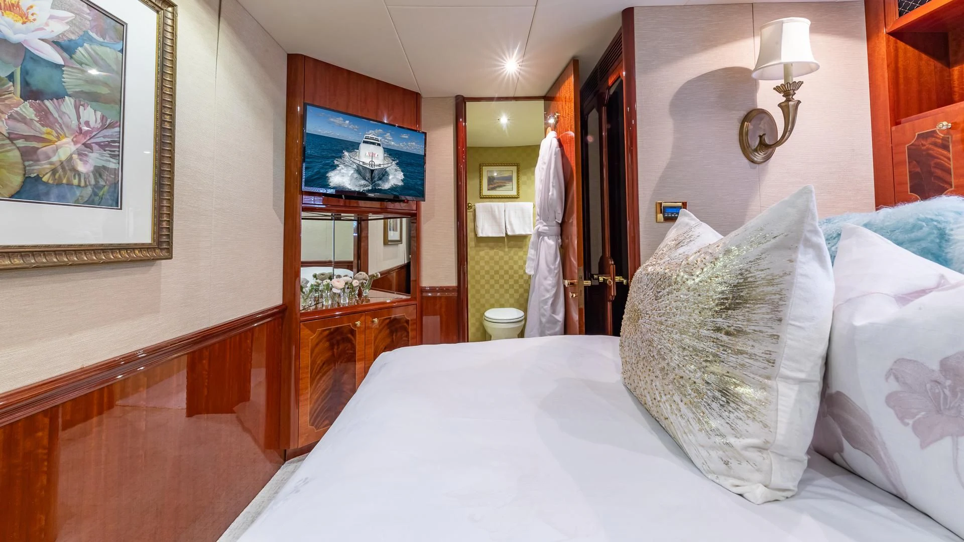 a bed with white sheets aboard HOPE FLOATS Yacht for Sale