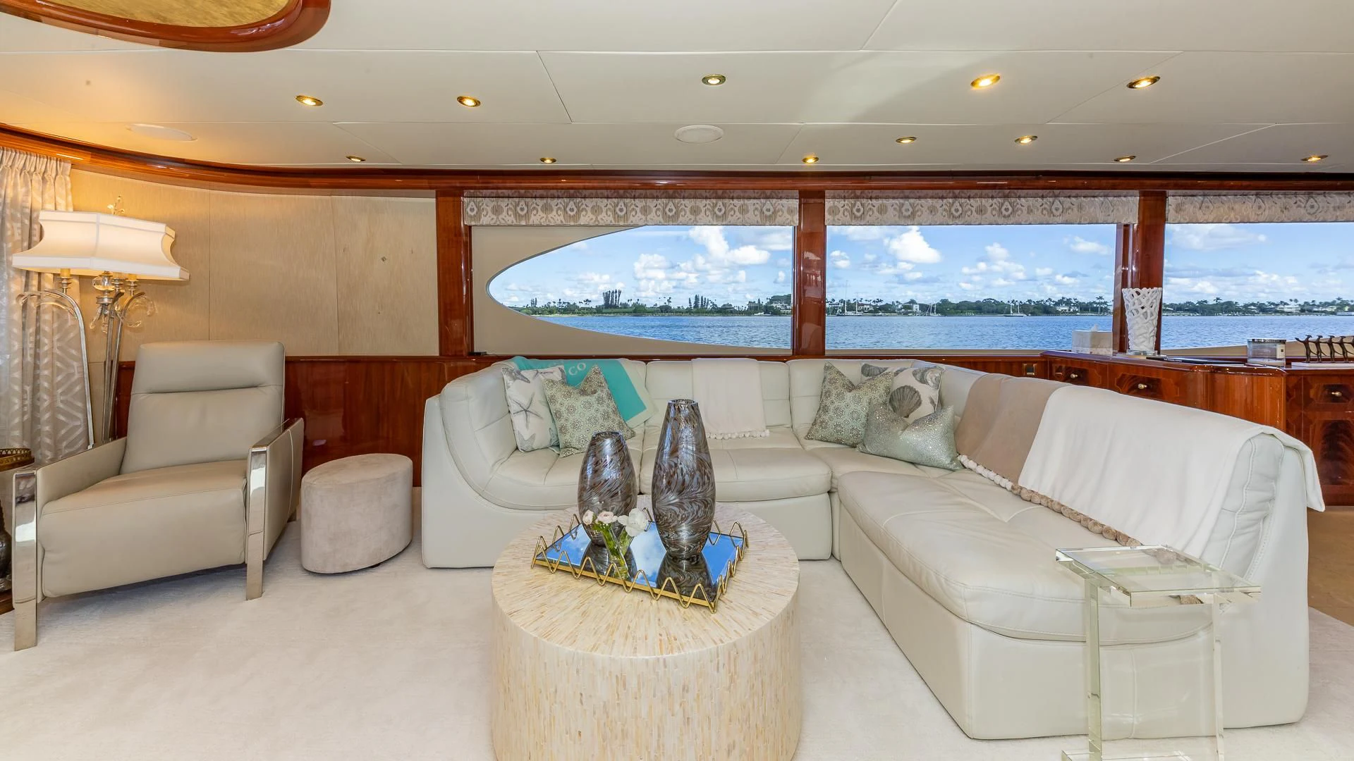 a living room with a large window aboard HOPE FLOATS Yacht for Sale