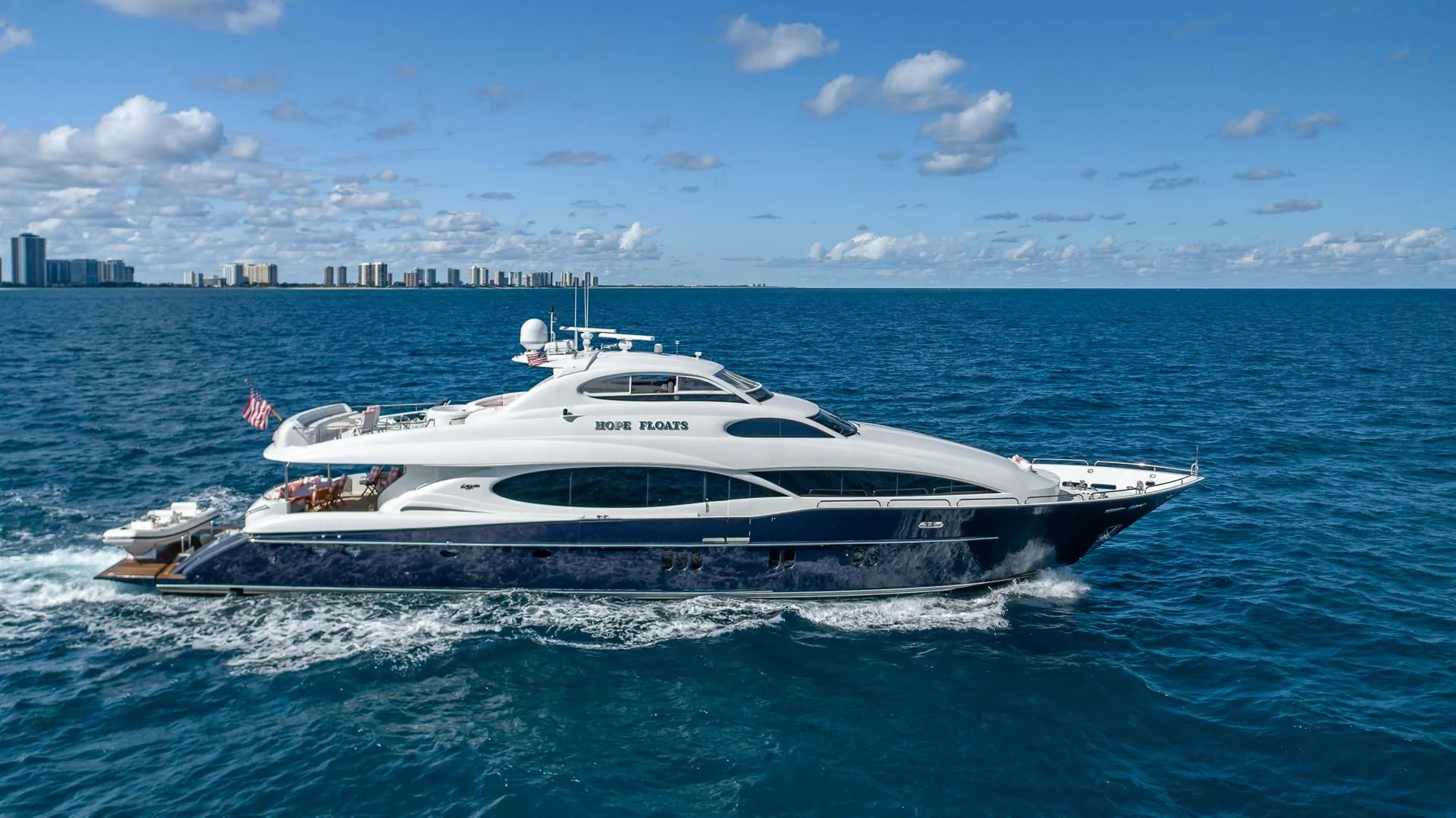a white yacht in the water aboard HOPE FLOATS Yacht for Sale